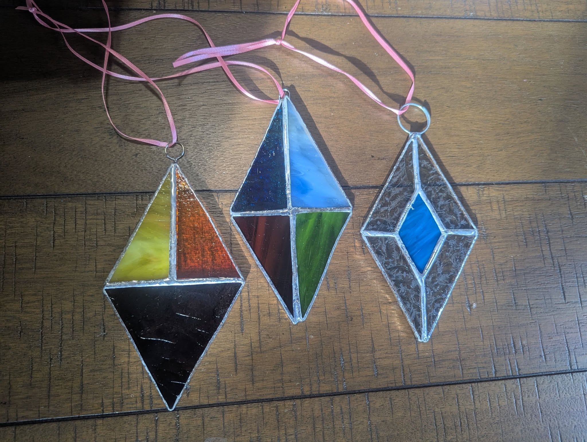 Stained glass pieces made in a Hearth & Horizon workshop